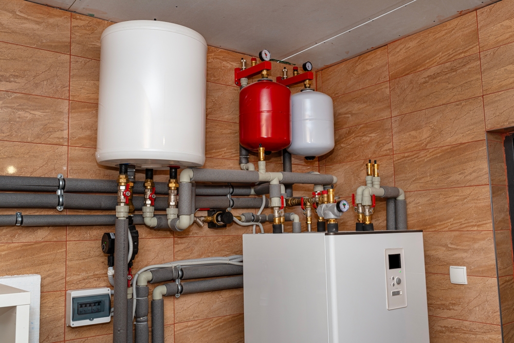 A,Modern,Air,Heat,Pump,Installed,In,The,Home's,Boiler A,Modern,Air,Heat,Pump,Installed,In,The,Home's,Boiler