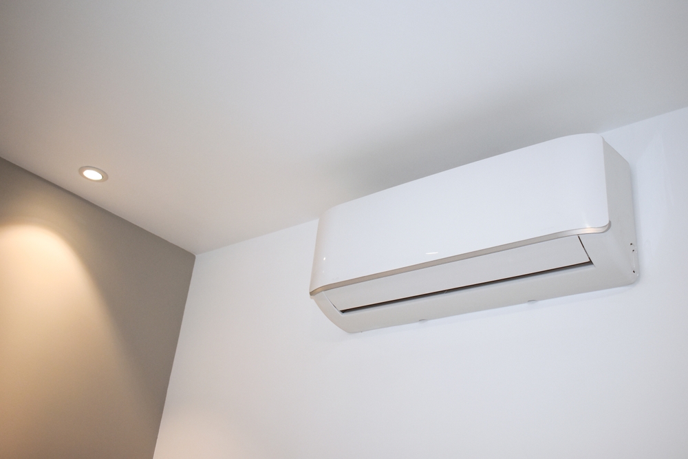 Air,Conditioning,Unit,On,Bedroom,Wall