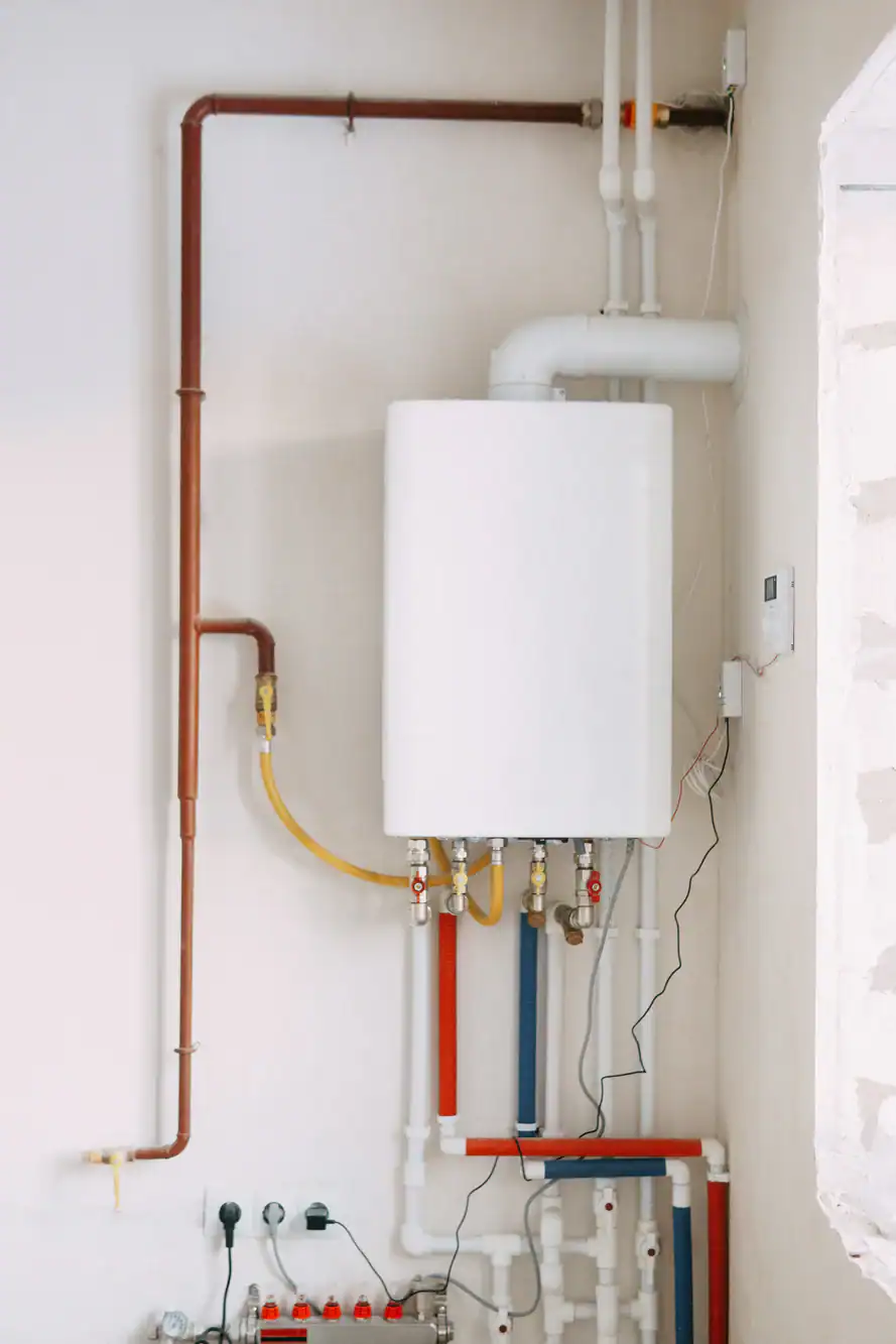 Boiler system with plumbing pipes installed for efficient heating solutions.