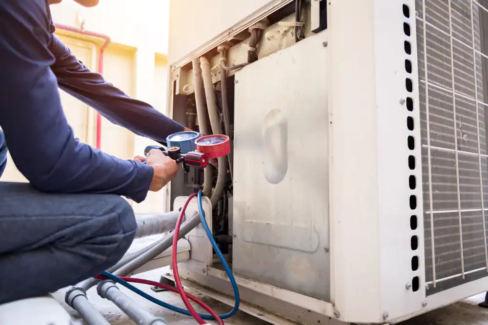 HVAC technician performing maintenance service in Essex County, New Jersey