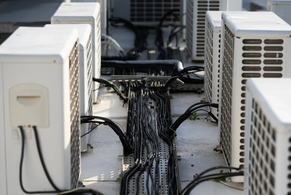 Rooftop AC units and utility cables on a commercial building in Essex County, New Jersey